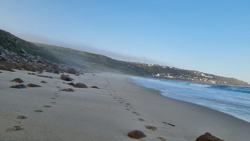 Tranquil beach scene at sunrise