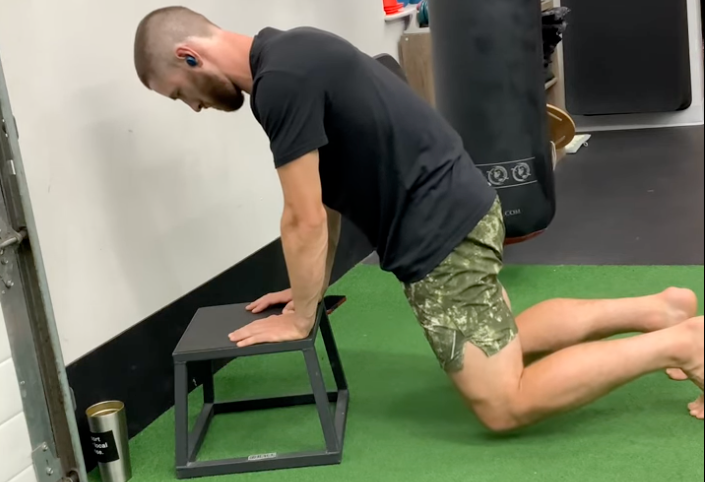 Posterior pelvic tilt demonstration